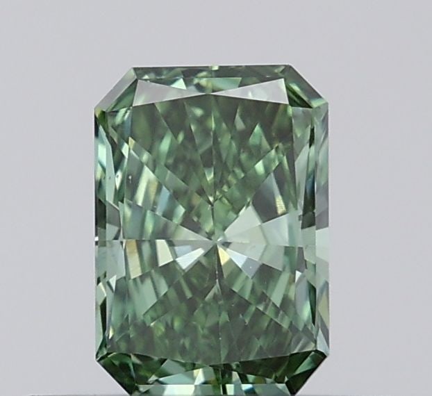 Loose Diamond - RADIANT 0.34ct Fancy Vivid Green VS1: Loose Diamond - RADIANT 0.34ct Fancy Vivid Green VS1 Source: This is a real non-mined Diamond that has been grown in a lab Shape: RADIANT Carats: 0.34 Color: Fancy Vivid Green Certification: IGI Video