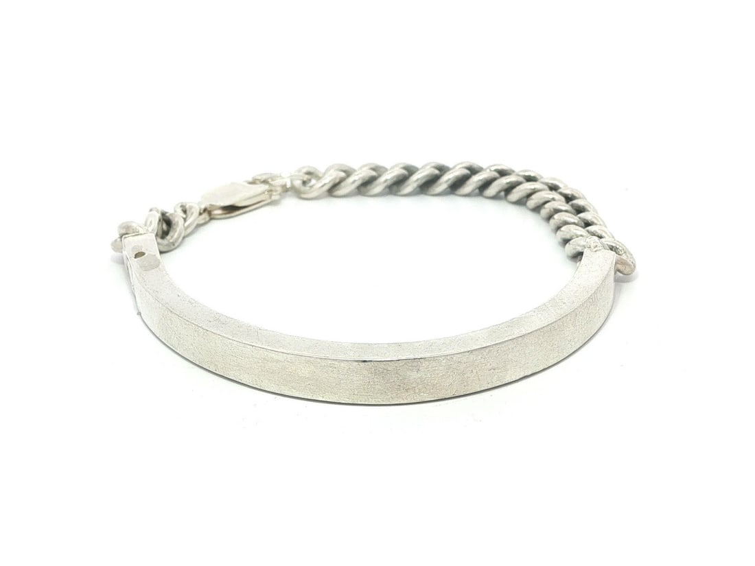 Michael Cohen Sterling Silver Cuff Bracelet with Curb Link Chain: Michael Cohen Sterling Silver Cuff Bracelet with Curb Link Chain This vintage handmade cuff bracelet features a curb link chain design crafted from sterling silver. It is designed for unisex adults an