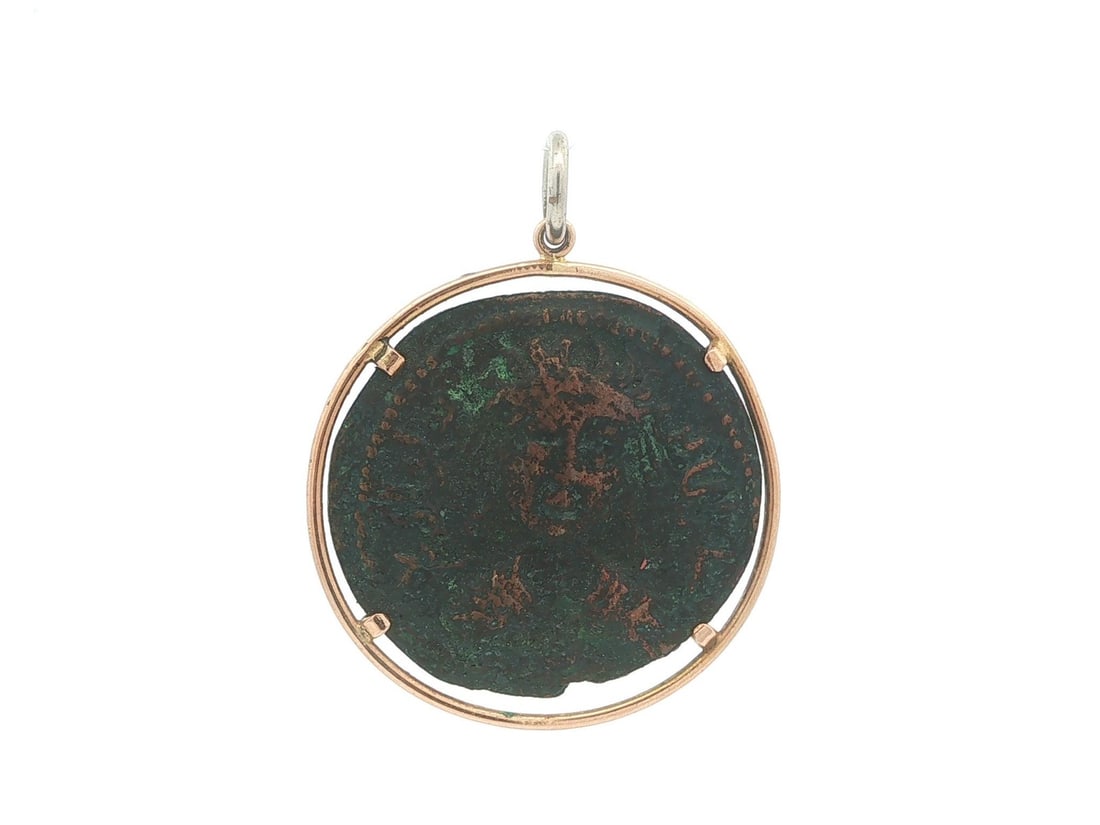 Unbranded Ancient Coin Pendant in 14k Yellow Gold Frame: Unbranded Ancient Coin Pendant in 14k Yellow Gold Frame Large ancient coin pendant set in a solid 14k yellow gold frame. The coin and bail are not gold. This pre-owned pendant shows light surface wear