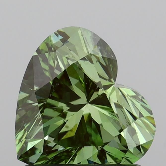 Loose Diamond - HEART 1.0ct Fancy Vivid Green SI1: Loose Diamond - HEART 1.0ct Fancy Vivid Green SI1 Source: This is a real non-mined Diamond that has been grown in a lab Shape: HEART Carats: 1.0 Color: Fancy Vivid Green Certification: IGI Video: