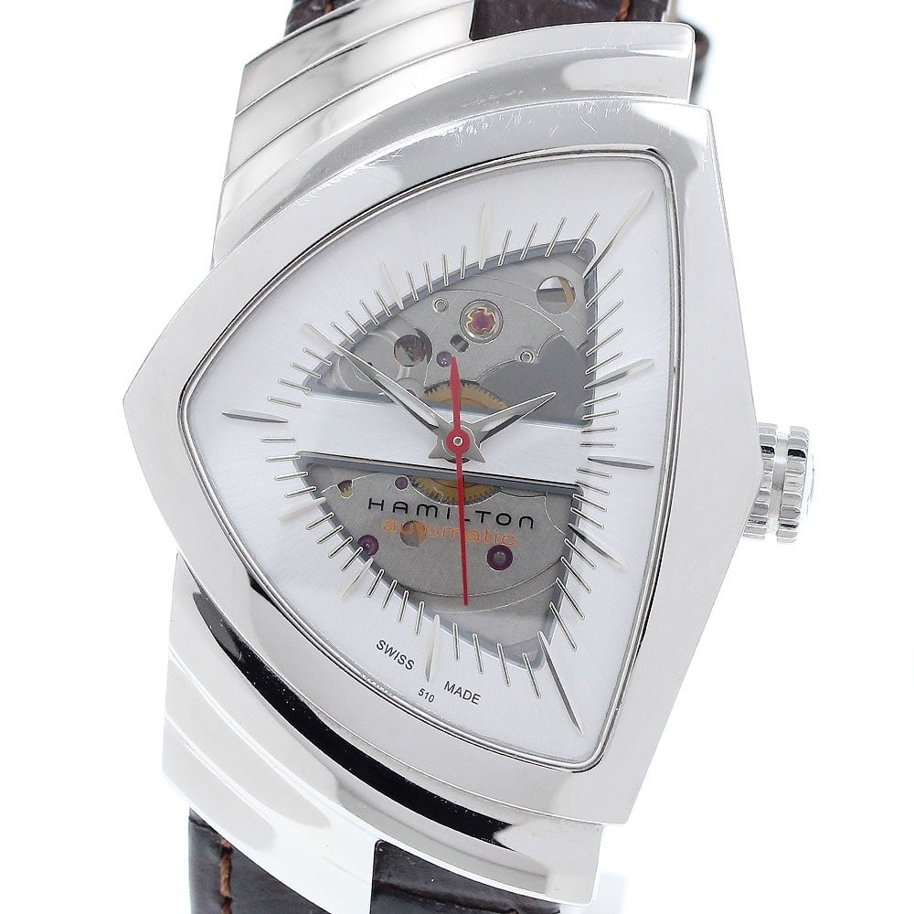 Hamilton Ventura Skeleton Automatic Men's Wristwatch H245150: Hamilton Ventura Skeleton Automatic Men's Wristwatch H245150 This Hamilton Ventura Skeleton men's wristwatch features a stainless steel case paired with a leather band. The watch is powered by an auto