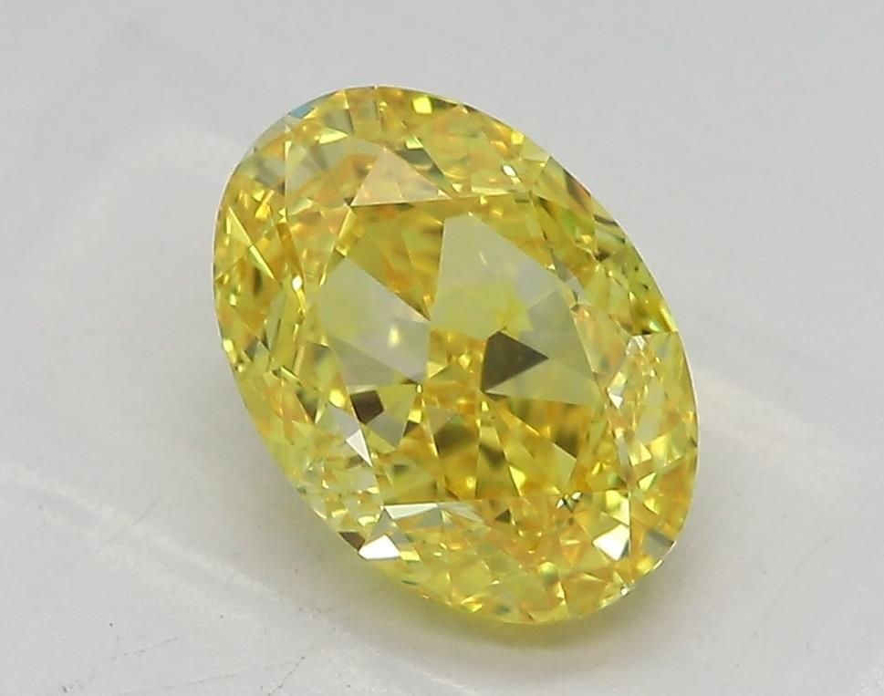 Loose Diamond - OVAL 2.03ct Fancy Vivid Yellow VS1: Loose Diamond - OVAL 2.03ct Fancy Vivid Yellow VS1 Source: This is a real non-mined Diamond that has been grown in a lab Shape: OVAL Carats: 2.03 Color: Fancy Vivid Yellow Certification: IGI Video: