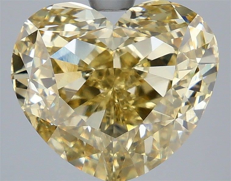 Loose Diamond - HEART 5.08ct Fancy Yellow VS1: Loose Diamond - HEART 5.08ct Fancy Yellow VS1 Source: This is a real non-mined Diamond that has been grown in a lab Shape: HEART Carats: 5.08 Color: Fancy Yellow Certification: IGI Video: Video Link