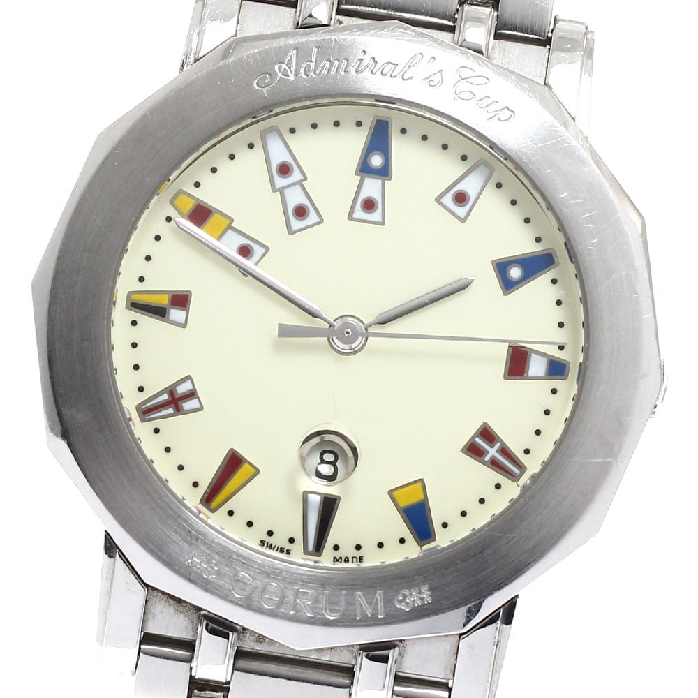 Corum Admiral's Cup quartz date stainless steel men's wristwatch: Corum Admiral's Cup quartz date stainless steel men's wristwatch This Corum Admiral's Cup Date Quartz men's wristwatch features a stainless steel case and bracelet, complemented by a beige dial. The w