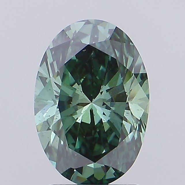 Loose Diamond - OVAL 2.2ct Fancy Vivid Green VS2: Loose Diamond - OVAL 2.2ct Fancy Vivid Green VS2 Source: This is a real non-mined Diamond that has been grown in a lab Shape: OVAL Carats: 2.2 Color: Fancy Vivid Green Certification: IGI Video: