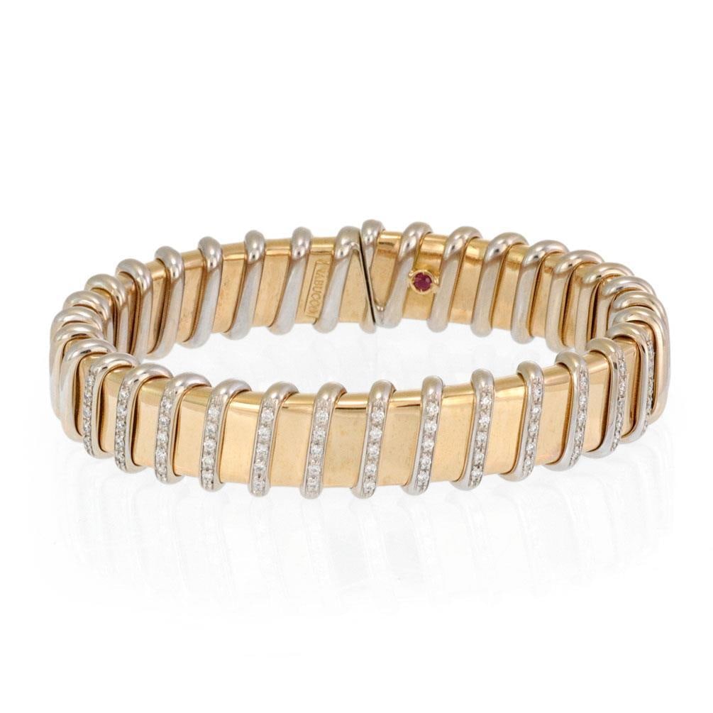 Roberto Coin Nabucco 1ct Diamond Flex Bracelet 18k Two Tone Gold: Roberto Coin Nabucco 1ct Diamond Flex Bracelet 18k Two Tone Gold Discover the elegance of the Nabucco Collection by Roberto Coin. This striking wide flex bracelet features a 13mm band crafted from 18k