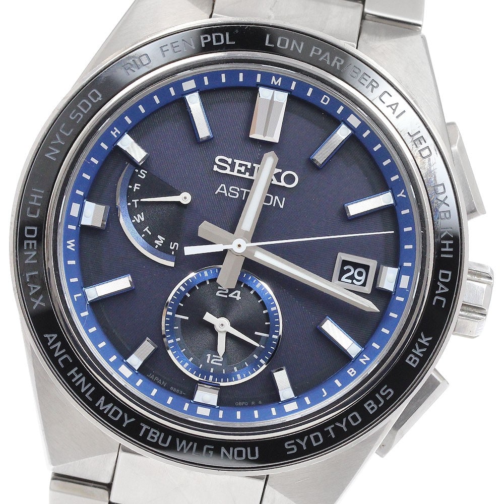 Seiko Astron Nexter Titanium Solar Radio Controlled Men's Wristwatch: Seiko Astron Nexter Titanium Solar Radio Controlled Men's Wristwatch This Seiko Astron Nexter men's wristwatch, model SBXY051/8B63-0BD0, features a titanium case and band with a navy dial. The watch i