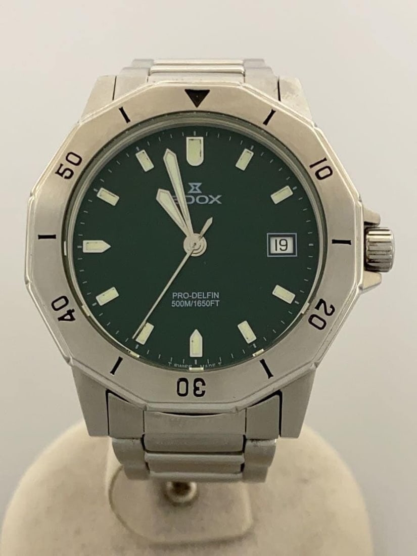 EDOX 70071 Green Quartz Men's Wristwatch: EDOX 70071 Green Quartz Men's Wristwatch This Edox Pro-Delfin 500M Quartz men's wristwatch features a green dial and is crafted in Switzerland. The watch shows slight signs of use and is in pre-owned 