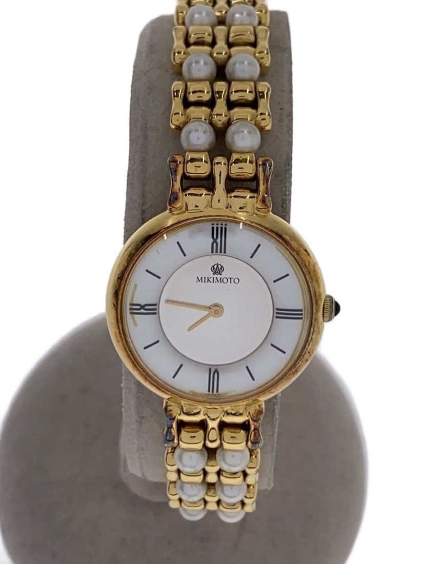 MIKIMOTO Pearl Quartz Women's Wristwatch 2P20-0530 Japan: MIKIMOTO Pearl Quartz Women's Wristwatch 2P20-0530 Japan This is a pre-owned Mikimoto women's wristwatch featuring a black case and band. The watch operates with a quartz movement and is designed with