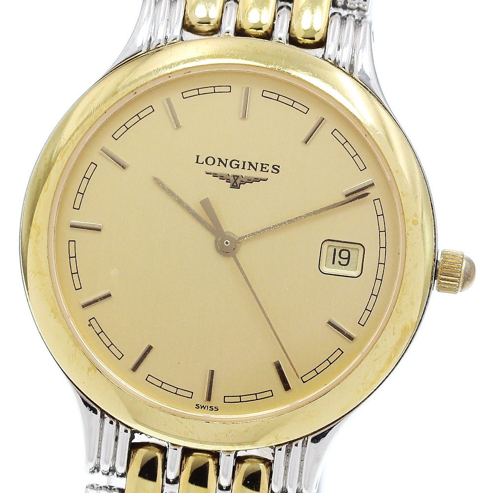 Longines Grand Classic Date Quartz Men's Wristwatch L5.649.3: Longines Grand Classic Date Quartz Men's Wristwatch L5.649.3 This Longines Grand Classic Date Quartz wristwatch for men features a stainless steel and gold case with a matching bracelet. The gold-tone