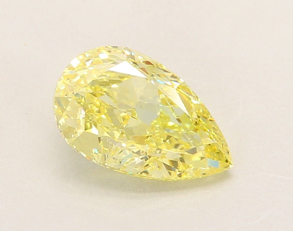 Loose Diamond - PEAR 2.71ct Fancy Intense Yellow VS1: Loose Diamond - PEAR 2.71ct Fancy Intense Yellow VS1 Source: This is a real non-mined Diamond that has been grown in a lab Shape: PEAR Carats: 2.71 Color: Fancy Intense Yellow Certification: IGI Video