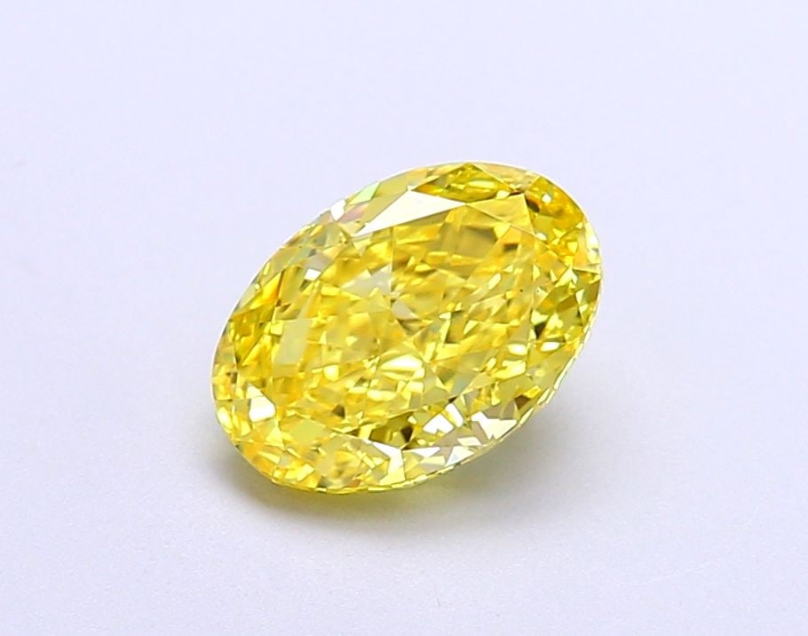 Loose Diamond - OVAL 1.38ct Fancy Vivid Yellow VVS2: Loose Diamond - OVAL 1.38ct Fancy Vivid Yellow VVS2 Source: This is a real non-mined Diamond that has been grown in a lab Shape: OVAL Carats: 1.38 Color: Fancy Vivid Yellow Certification: IGI Video: