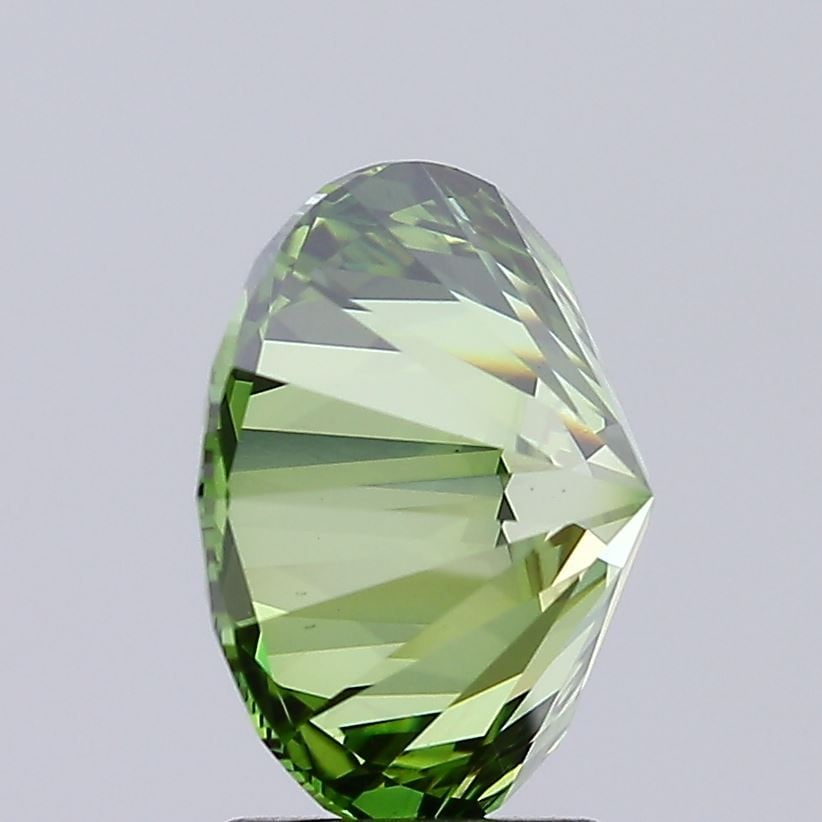 Ideal Loose Diamond - ROUND 4.01ct Fancy Vivid Green VS2: Ideal Loose Diamond - ROUND 4.01ct Fancy Vivid Green VS2 Source: This is a real non-mined Diamond that has been grown in a lab Shape: ROUND Carats: 4.01 Color: Fancy Vivid Green Certification: IGI Vid