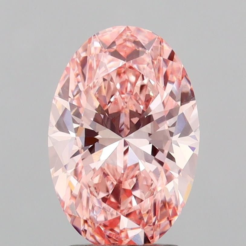 Loose Diamond - OVAL 2.2ct Fancy Vivid Pink VVS2: Loose Diamond - OVAL 2.2ct Fancy Vivid Pink VVS2 Source: This is a real non-mined Diamond that has been grown in a lab Shape: OVAL Carats: 2.2 Color: Fancy Vivid Pink Certification: IGI Video: