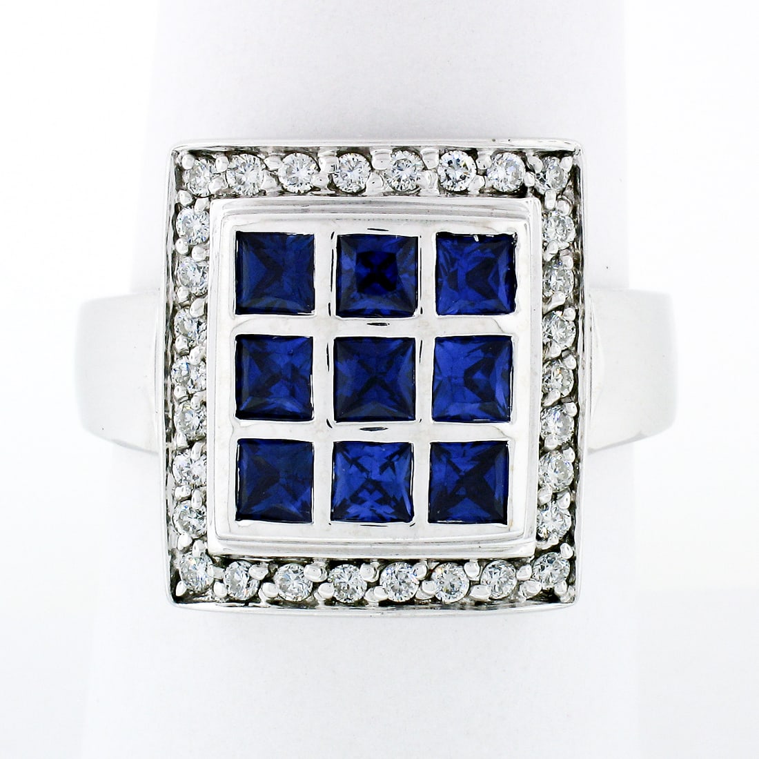De Hago 18k White Gold 2.65ct Sapphire Diamond Cocktail Ring: De Hago 18k White Gold 2.65ct Sapphire Diamond Cocktail Ring This stunning De Hago cocktail ring is crafted in solid 18k white gold, featuring a remarkable square dome design. The ring showcases nine 