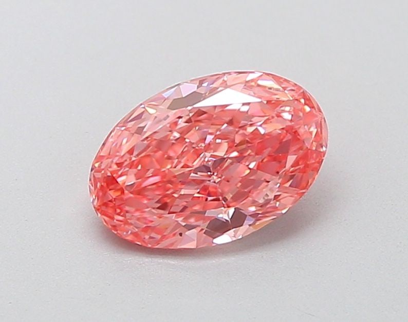 Loose Diamond - OVAL 1.07ct Fancy Vivid Pink VS2: Loose Diamond - OVAL 1.07ct Fancy Vivid Pink VS2 Source: This is a real non-mined Diamond that has been grown in a lab Shape: OVAL Carats: 1.07 Color: Fancy Vivid Pink Certification: IGI Video: