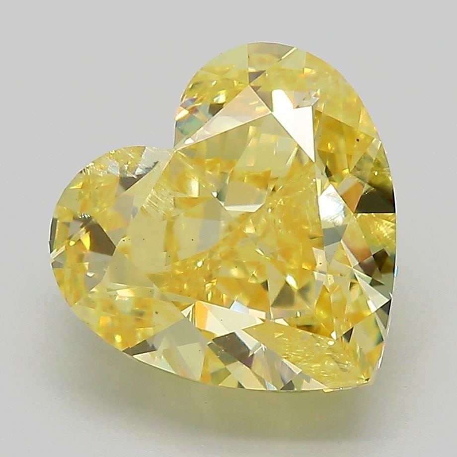 Loose Diamond - HEART 5.46ct Fancy Yellow SI2: Loose Diamond - HEART 5.46ct Fancy Yellow SI2 Source: This is a real non-mined Diamond that has been grown in a lab Shape: HEART Carats: 5.46 Color: Fancy Yellow Certification: IGI Video: