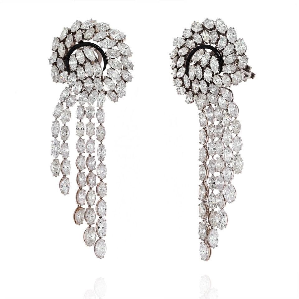 52 Carat Platinum Cascading Marquise Cut Diamond Earrings: 52 Carat Platinum Cascading Marquise Cut Diamond Earrings Make a statement with these stunning 52 Carat Elaborate Diamond Waterfall Cascading Marquise Cut Earrings. Crafted from luxurious platinum,