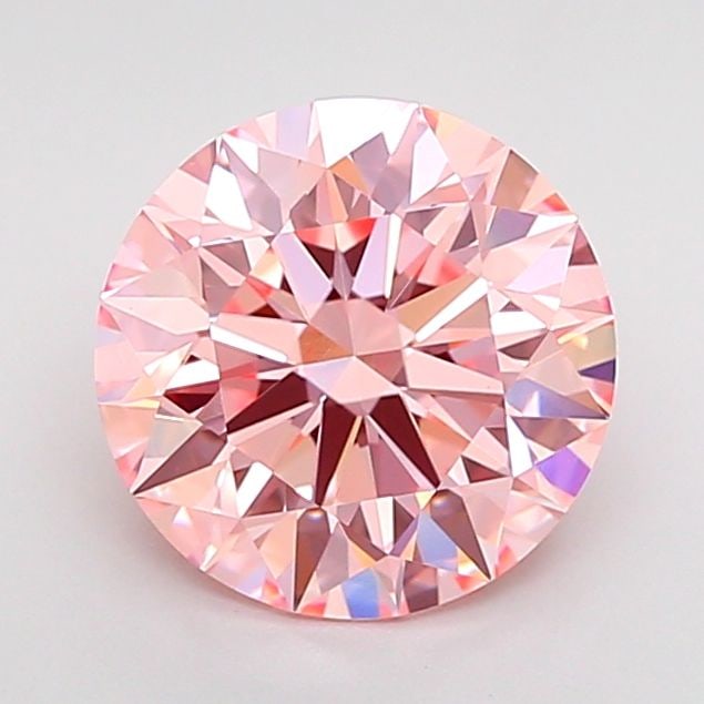 Ideal Loose Diamond - ROUND 2.25ct Fancy Vivid Pink VVS2: Ideal Loose Diamond - ROUND 2.25ct Fancy Vivid Pink VVS2 Source: This is a real non-mined Diamond that has been grown in a lab Shape: ROUND Carats: 2.25 Color: Fancy Vivid Pink Certification: IGI Vide