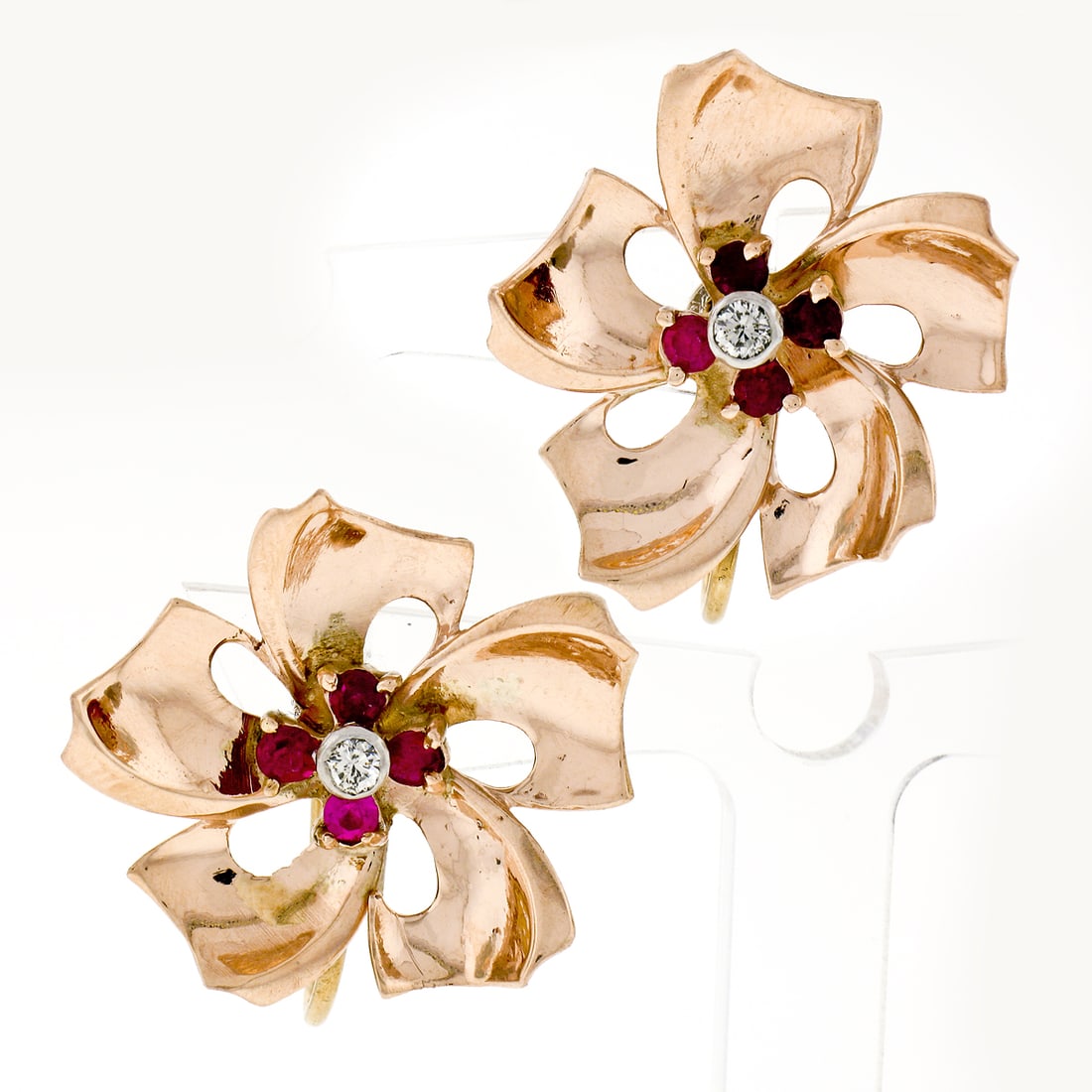 Vintage 13k Rose Gold 0.62ctw Ruby Diamond Flower Earrings: Vintage 13k Rose Gold 0.62ctw Ruby Diamond Flower Earrings Elevate your style with these stunning Retro Vintage Rose Gold Earrings, featuring a captivating floral design. Crafted from solid 13k rose g