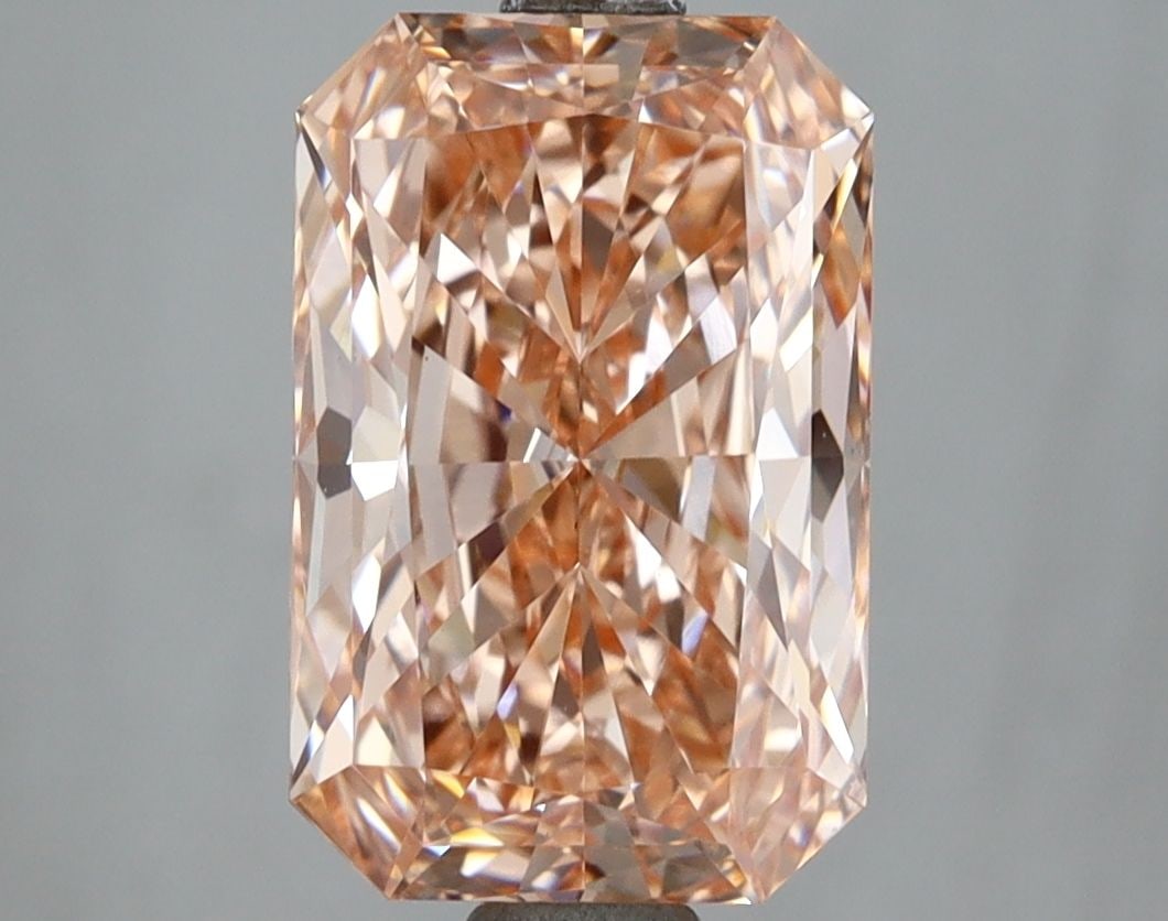 Loose Diamond - RADIANT 3.07ct Fancy Vivid Orangey Pink VS1: Loose Diamond - RADIANT 3.07ct Fancy Vivid Orangey Pink VS1 Source: This is a real non-mined Diamond that has been grown in a lab Shape: RADIANT Carats: 3.07 Color: Fancy Vivid Orangey Pink Certificat