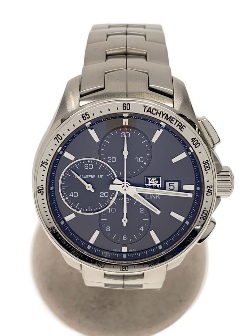 TAG Heuer Link CAT2017 Swiss Men's Wristwatch: TAG Heuer Link CAT2017 Swiss Men's Wristwatch This TAG Heuer LINK CAT2017 men's wristwatch features a Swiss-made design and showcases slight signs of use, typical of a pre-owned item. The watch has no
