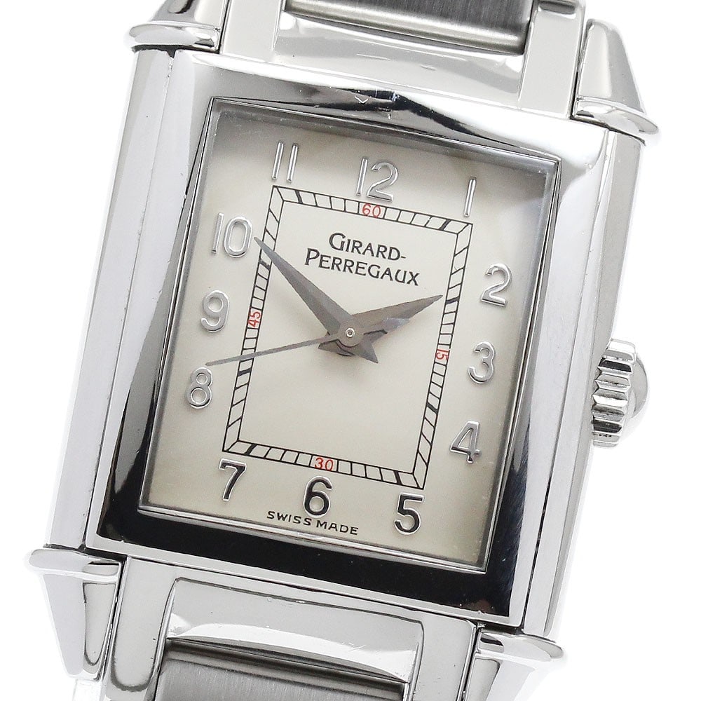 Girard Perregaux Vintage 1945 womens manual wind stainless steel watch 25900: Girard Perregaux Vintage 1945 womens manual wind stainless steel watch 25900 This Girard Perregaux Vintage 1945 ladies' wristwatch features a stainless steel case and bracelet with a beige dial. Power