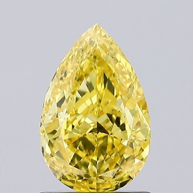 Loose Diamond - PEAR 1.01ct Fancy Vivid Yellow SI1: Loose Diamond - PEAR 1.01ct Fancy Vivid Yellow SI1 Source: This is a real non-mined Diamond that has been grown in a lab Shape: PEAR Carats: 1.01 Color: Fancy Vivid Yellow Certification: IGI Video: