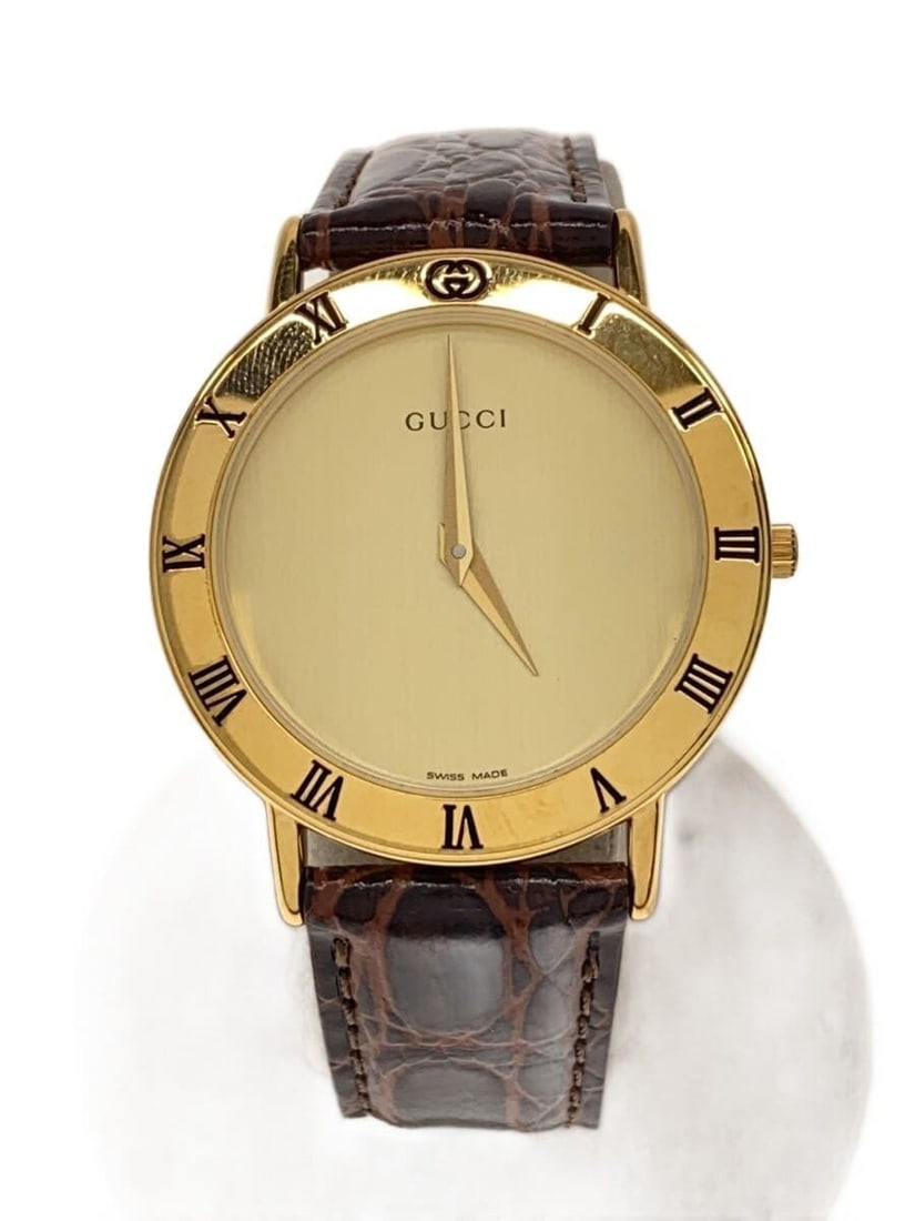 Gucci Swiss Quartz Ladies Wristwatch With Non Original Strap: Gucci Swiss Quartz Ladies Wristwatch With Non Original Strap This GUCCI quartz wristwatch for women features a Swiss-made movement and a non-original strap. The watch is pre-owned and graded as B, ind