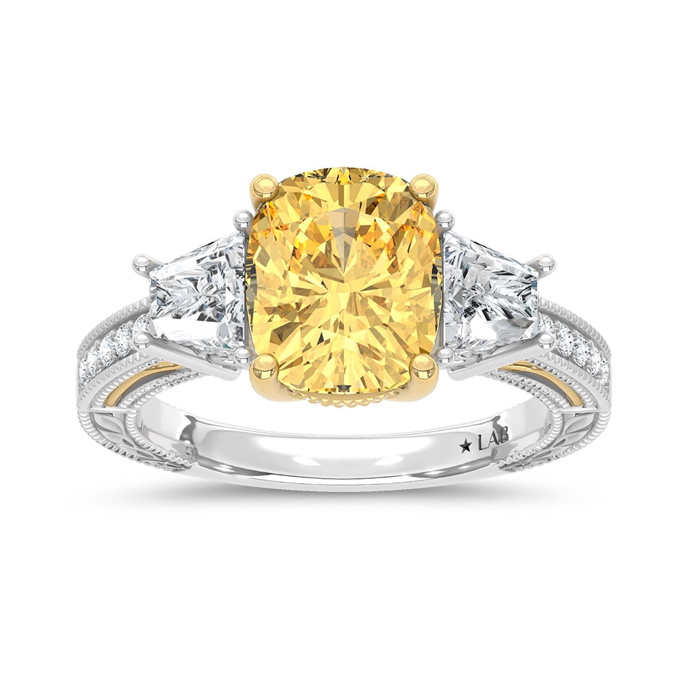 14K Two Tone Gold Lab Grown Diamond 5 1/6 Ct.Tw. Yellow Cushion Engagement Ring (Center 4ct): 14K Two Tone Gold Lab Grown Diamond 5 1/6 Ct.Tw. Yellow Cushion Engagement Ring (Center 4ct) Expertly crafted in 14K Two-Tone Gold, this breathtaking engagement ring showcases a 4 Ct. cushion-cut lab 