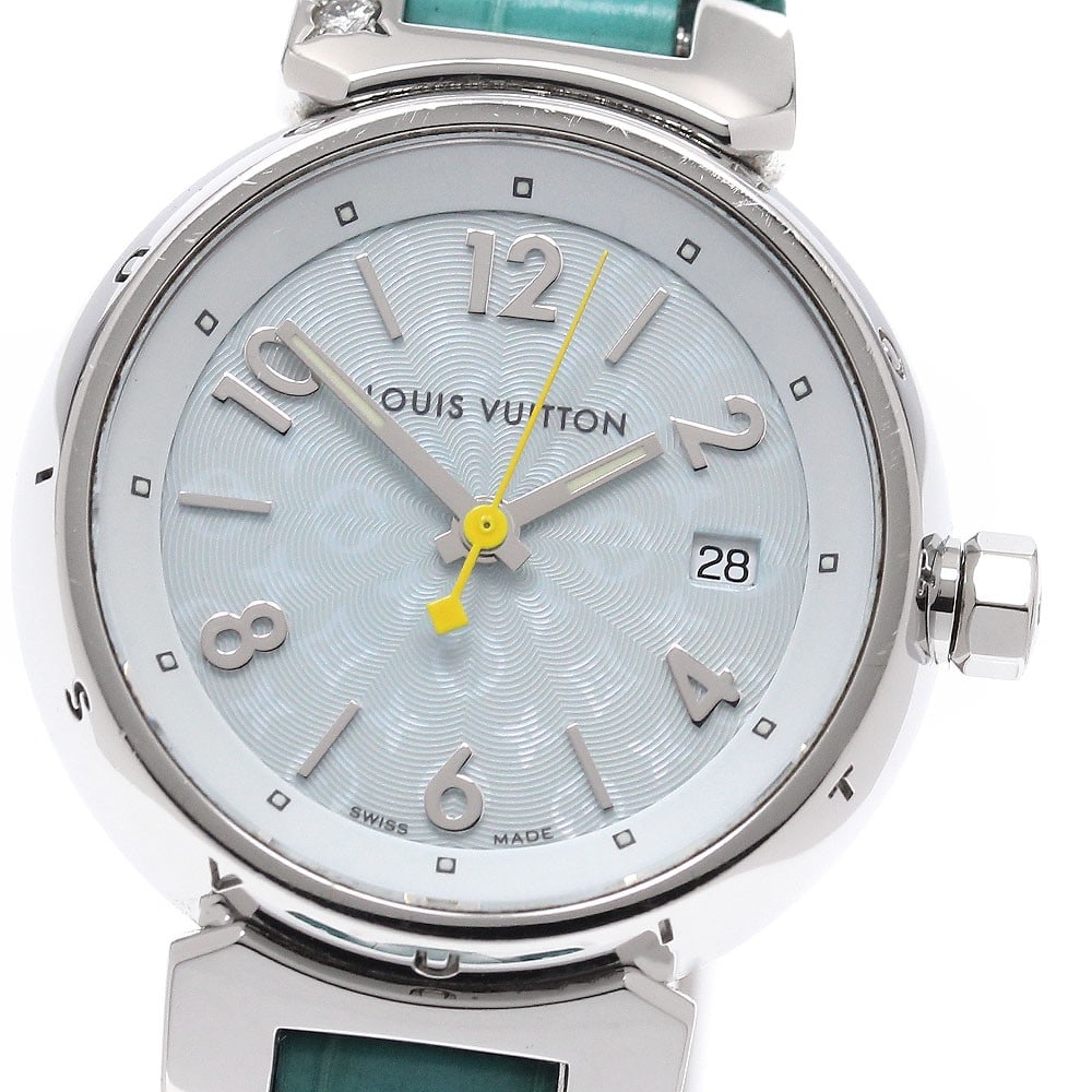 Louis Vuitton Tambour quartz date ladies wristwatch Q121V: Louis Vuitton Tambour quartz date ladies wristwatch Q121V This LOUIS VUITTON Tambour Date Quartz women's wristwatch features a stainless steel case paired with a leather bracelet and an ice blue dial.