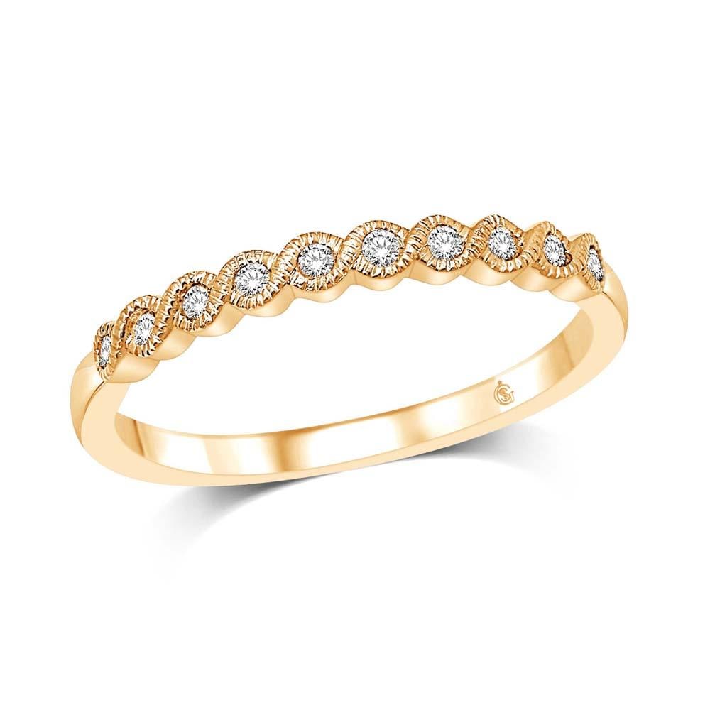 14K Yellow Gold 1/10 Ct.Tw. Diamond Stackable Band: 14K Yellow Gold 1/10 Ct.Tw. Diamond Stackable Band This Glamorous Stackable band Is Available In 14K Yellow Gold. There Are 10 Round Diamonds With A Total Carat Weight Of 1/10 Ct.Tw. Set In A Bezel Se