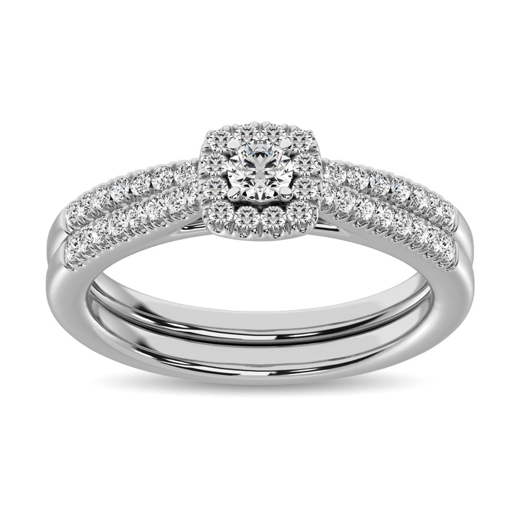 10K White Gold 2/5 Ct.tw Diamond Bridal Ring: 10K White Gold 2/5 Ct.tw Diamond Bridal Ring Celebrate your romance with this sweet diamond bridal ring. Crafted in cool 10K white gold, this feminine design features a shimmering round cut diamond wr