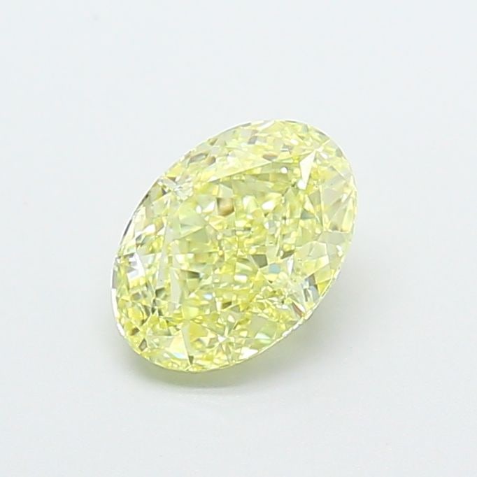 Loose Diamond - OVAL 1.23ct Fancy Yellow VS2: Loose Diamond - OVAL 1.23ct Fancy Yellow VS2 Source: This is a real non-mined Diamond that has been grown in a lab Shape: OVAL Carats: 1.23 Color: Fancy Yellow Certification: IGI Video: