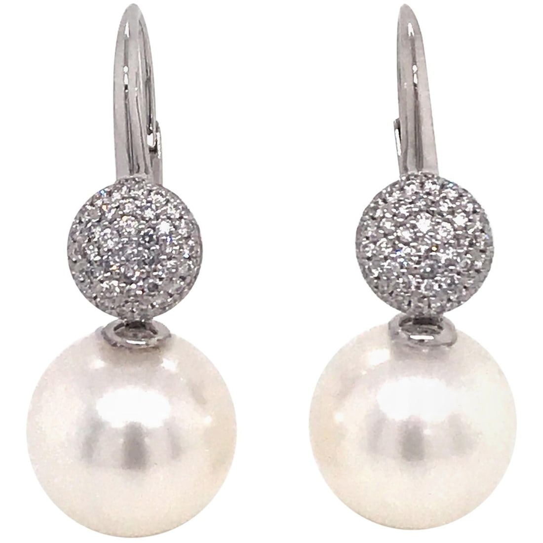 Contemporary Harbor Diamonds 18K White Gold Pearl Diamond Drop Earrings: Contemporary Harbor Diamonds 18K White Gold Pearl Diamond Drop Earrings Elevate your elegance with these stunning drop earrings crafted from 18K white gold. Featuring two exquisite South Sea pearls me