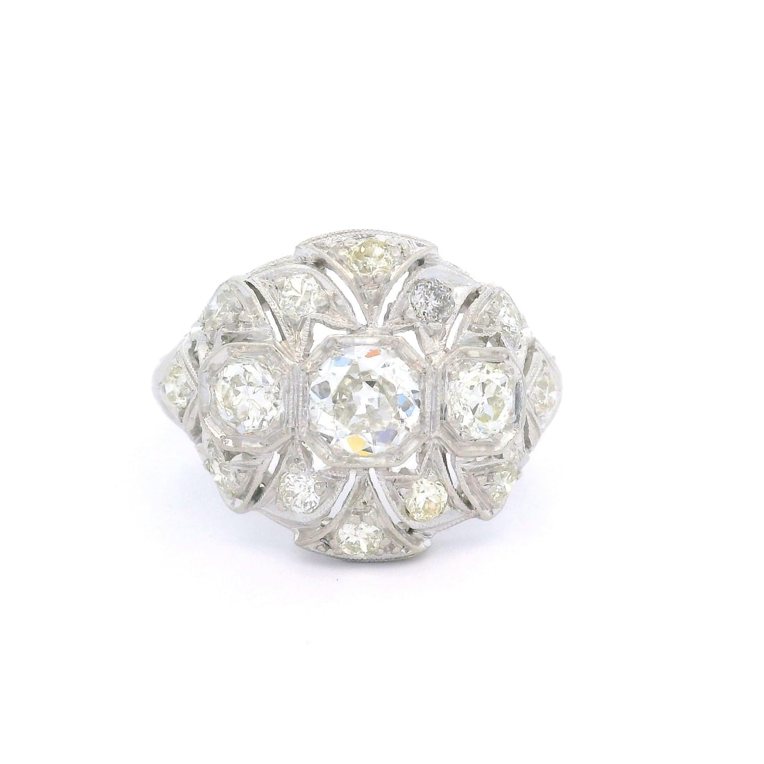 Antique Edwardian Platinum 0.84ctw Diamond Ring Old European & Single Cut: Antique Edwardian Platinum 0.84ctw Diamond Ring Old European & Single Cut This exquisite Antique Edwardian ring showcases a stunning collection of diamonds set in solid platinum. The centerpiece featu