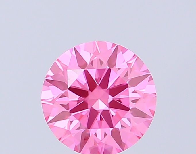 Loose Diamond - ROUND 0.55ct Fancy Vivid Pink VVS2: Loose Diamond - ROUND 0.55ct Fancy Vivid Pink VVS2 Source: This is a real non-mined Diamond that has been grown in a lab Shape: ROUND Carats: 0.55 Color: Fancy Vivid Pink Certification: IGI Video: