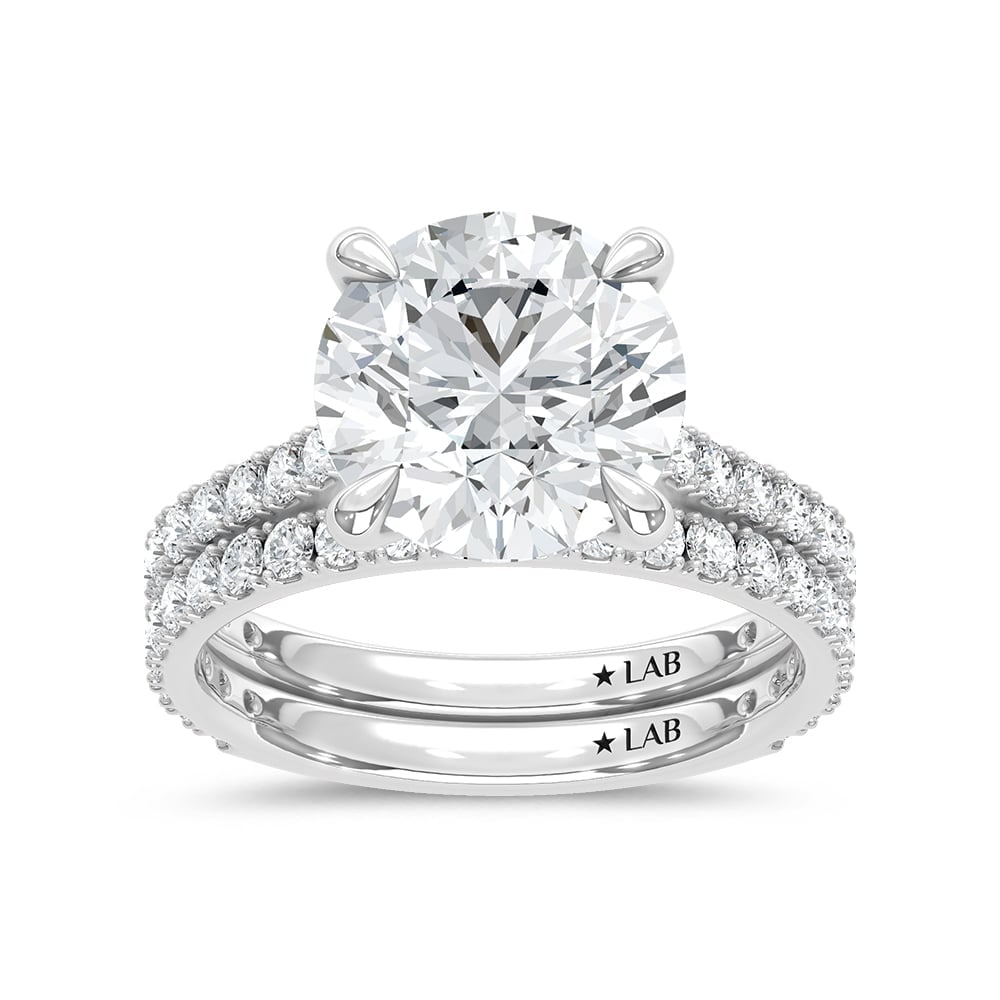 14K White Gold Lab Grown Diamond 5 1/2 Ct.Tw. Bridal Ring: 14K White Gold Lab Grown Diamond 5 1/2 Ct.Tw. Bridal Ring 14k White Gold Stone Color: D-f Stone Clarity: Vs Each ring is presented in standard size 6.5. Complimentary resizing is available between siz