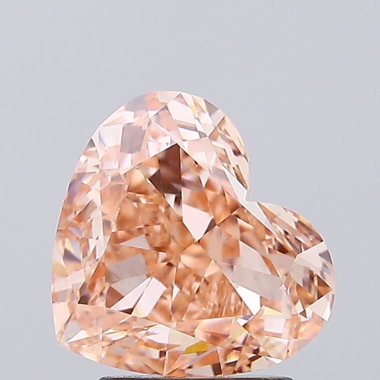 Loose Diamond - HEART 3.01ct Fancy Orange Brown VS1: Loose Diamond - HEART 3.01ct Fancy Orange Brown VS1 Source: This is a real non-mined Diamond that has been grown in a lab Shape: HEART Carats: 3.01 Color: Fancy Orange Brown Certification: IGI Video: