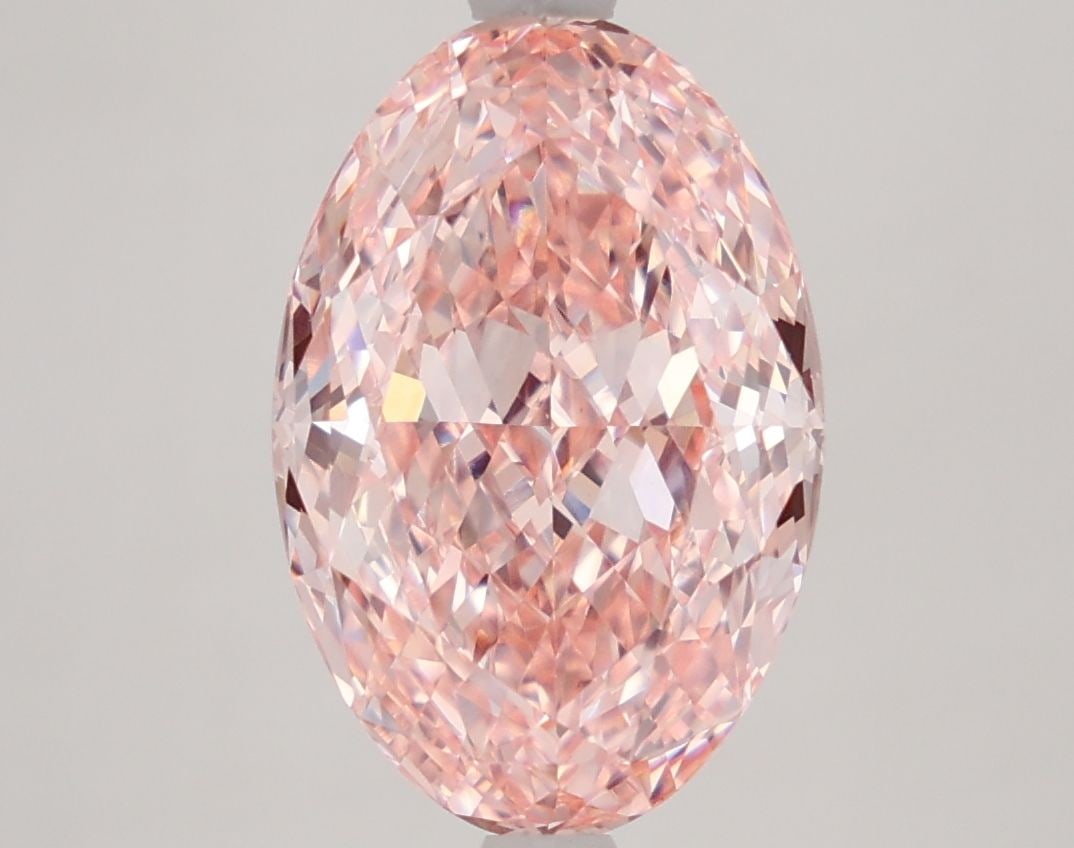 Loose Diamond - OVAL 4.3ct Fancy Vivid Pink VVS2: Loose Diamond - OVAL 4.3ct Fancy Vivid Pink VVS2 Source: This is a real non-mined Diamond that has been grown in a lab Shape: OVAL Carats: 4.3 Color: Fancy Vivid Pink Certification: IGI Video: