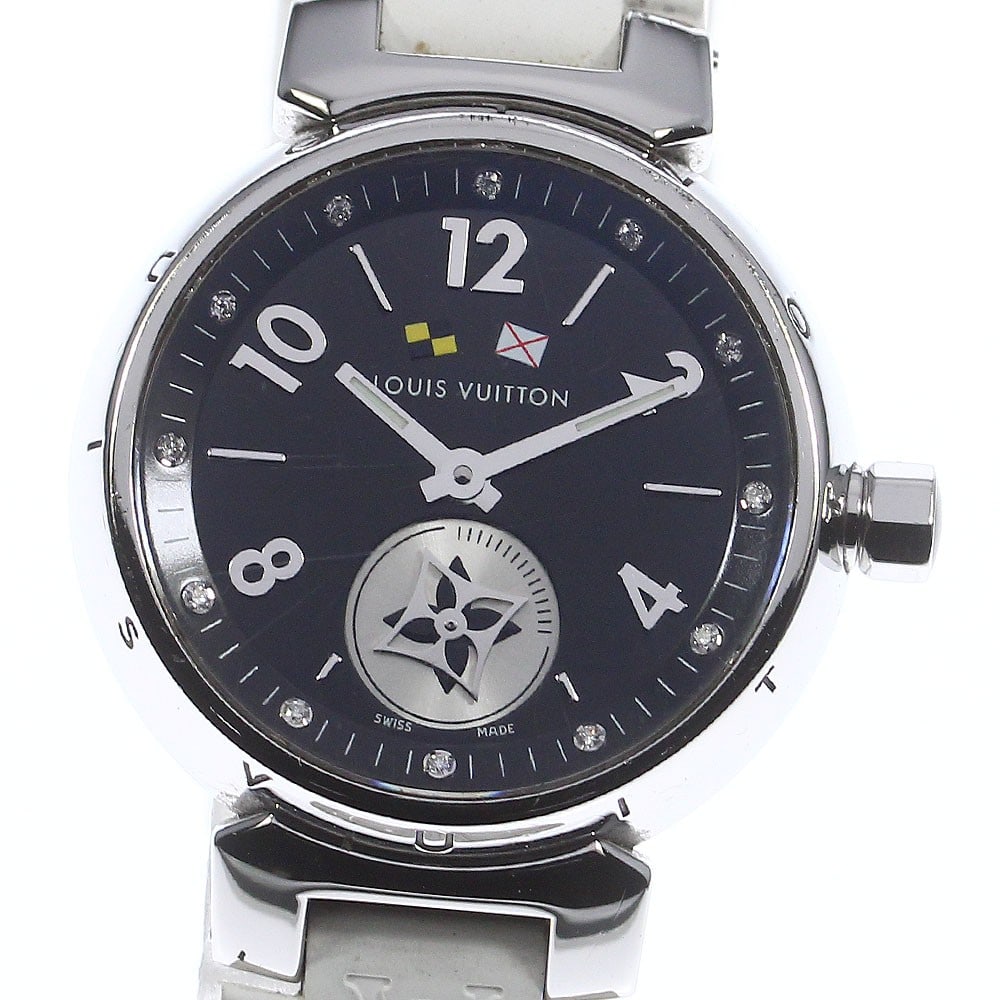 Louis Vuitton Tambour Q12M1 Quartz Ladies Wristwatch: Louis Vuitton Tambour Q12M1 Quartz Ladies Wristwatch This Louis Vuitton Tambour Quartz women's wristwatch features a stainless steel case paired with a black rubber strap. The watch is powered by a qu