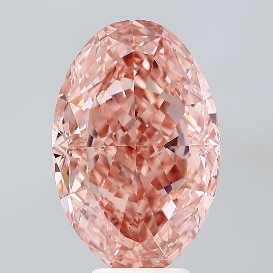 Loose Diamond - OVAL 7.02ct Fancy Vivid Pink VS2: Loose Diamond - OVAL 7.02ct Fancy Vivid Pink VS2 Source: This is a real non-mined Diamond that has been grown in a lab Shape: OVAL Carats: 7.02 Color: Fancy Vivid Pink Certification: IGI Video: