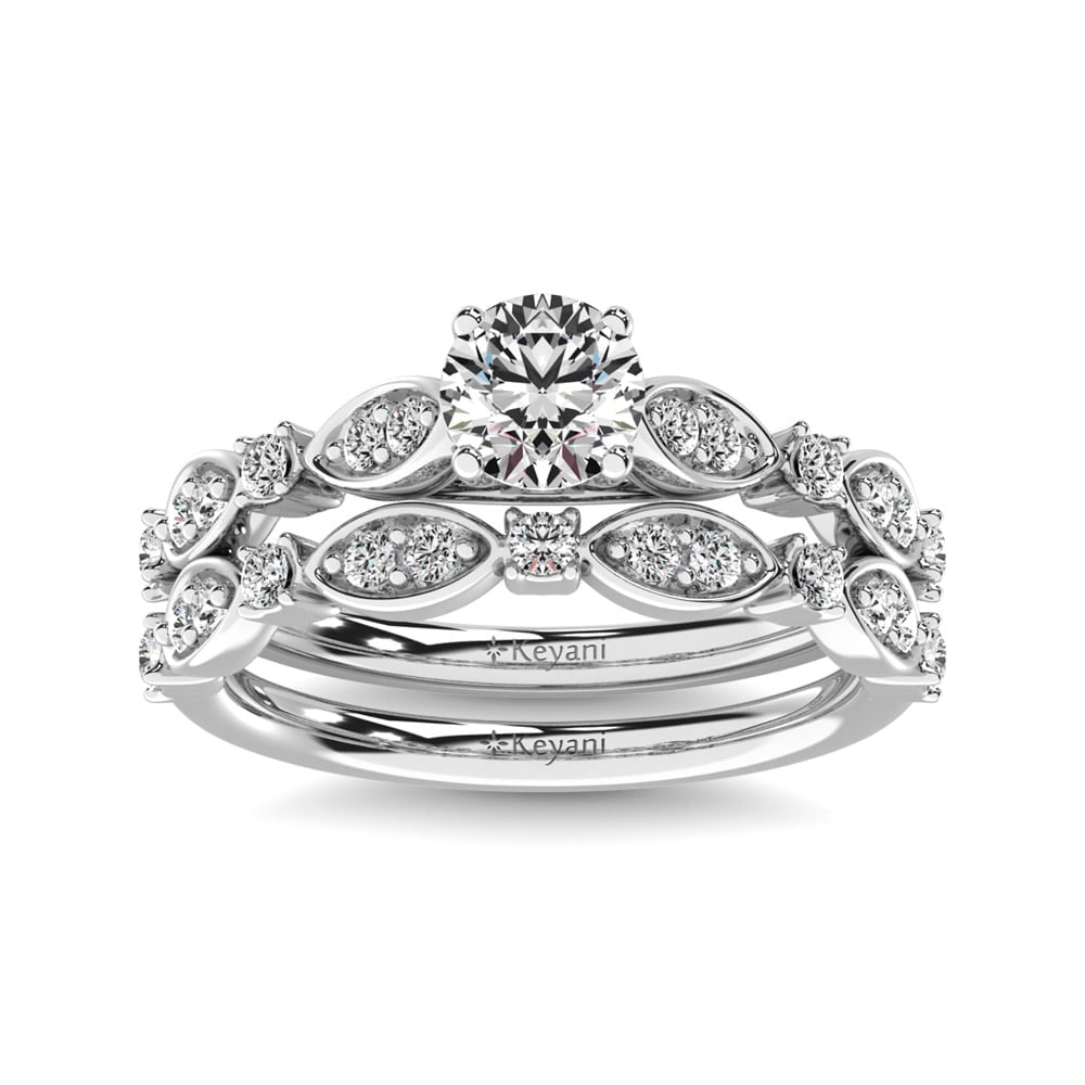 Diamond 1/2 Ct.Tw. Bridal Ring in 14K White Gold: Diamond 1/2 Ct.Tw. Bridal Ring in 14K White Gold 14k White Gold Stone Color: G-h Stone Clarity: Si2 Each ring is presented in standard size 6.5. Complimentary resizing is available between sizes 510 (