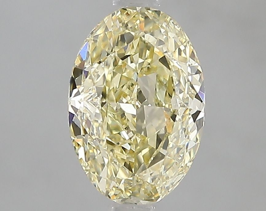 Loose Diamond - OVAL 1.82ct Fancy Yellow VS1: Loose Diamond - OVAL 1.82ct Fancy Yellow VS1 Source: This is a real non-mined Diamond that has been grown in a lab Shape: OVAL Carats: 1.82 Color: Fancy Yellow Certification: IGI Video: