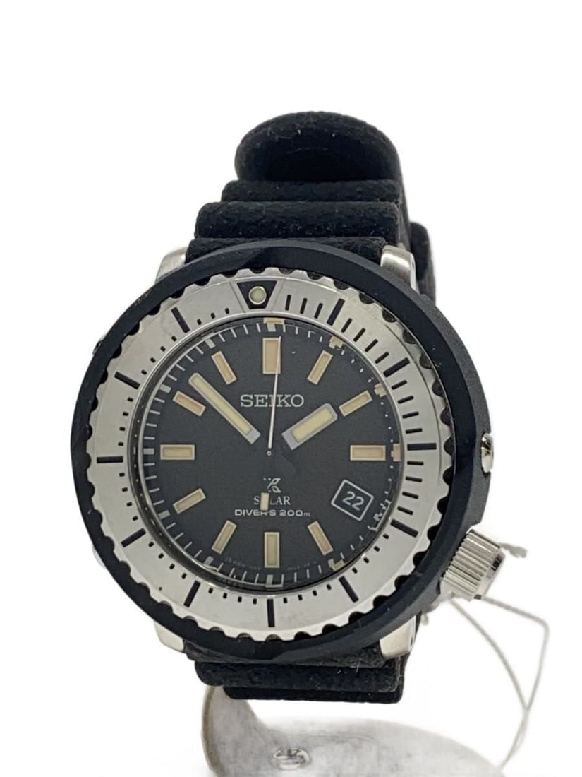 Seiko Prospex Black Rubber Men's Wristwatch V157-0DD0: Seiko Prospex Black Rubber Men's Wristwatch V157-0DD0 This SEIKO PROSPEX V157-0DD0 is a men's wristwatch featuring a black rubber band and a robust design. Made in Japan, this pre-owned watch is in sl