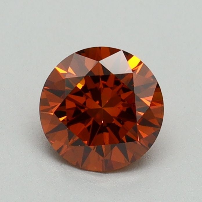 Loose Diamond - ROUND 0.7ct Fancy Deep Orange VS1: Loose Diamond - ROUND 0.7ct Fancy Deep Orange VS1 Source: This is a real non-mined Diamond that has been grown in a lab Shape: ROUND Carats: 0.7 Color: Fancy Deep Orange Certification: IGI Video: