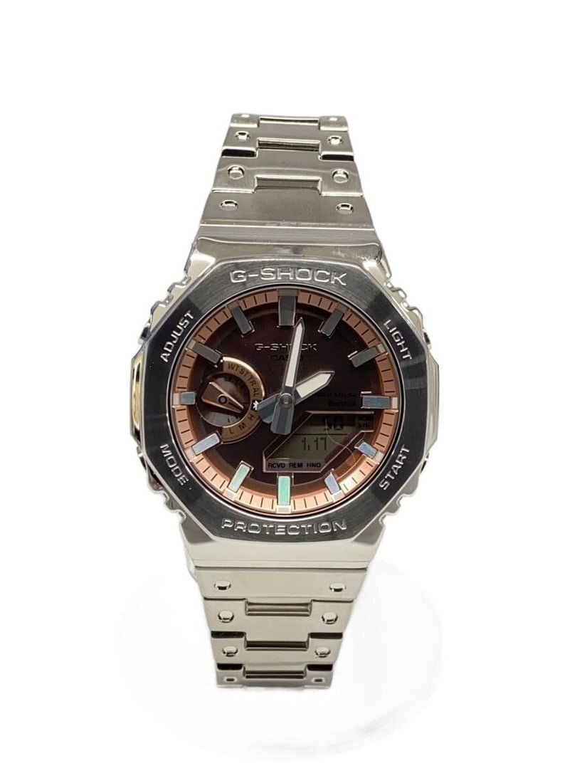Casio G-Shock GM-B2100AD-5AJF stainless steel men's wristwatch: Casio G-Shock GM-B2100AD-5AJF stainless steel men's wristwatch This CASIO G-SHOCK GM-B2100AD-5AJF men's wristwatch features a durable stainless steel construction with a distinctive pink color. Design