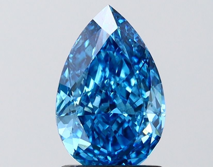 Loose Diamond - PEAR 1.51ct Fancy Vivid Blue VS1: Loose Diamond - PEAR 1.51ct Fancy Vivid Blue VS1 Source: This is a real non-mined Diamond that has been grown in a lab Shape: PEAR Carats: 1.51 Color: Fancy Vivid Blue Certification: IGI Video: