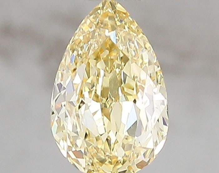 Loose Diamond - PEAR 1.01ct Fancy Vivid Yellow VVS2: Loose Diamond - PEAR 1.01ct Fancy Vivid Yellow VVS2 Source: This is a real non-mined Diamond that has been grown in a lab Shape: PEAR Carats: 1.01 Color: Fancy Vivid Yellow Certification: IGI Video: