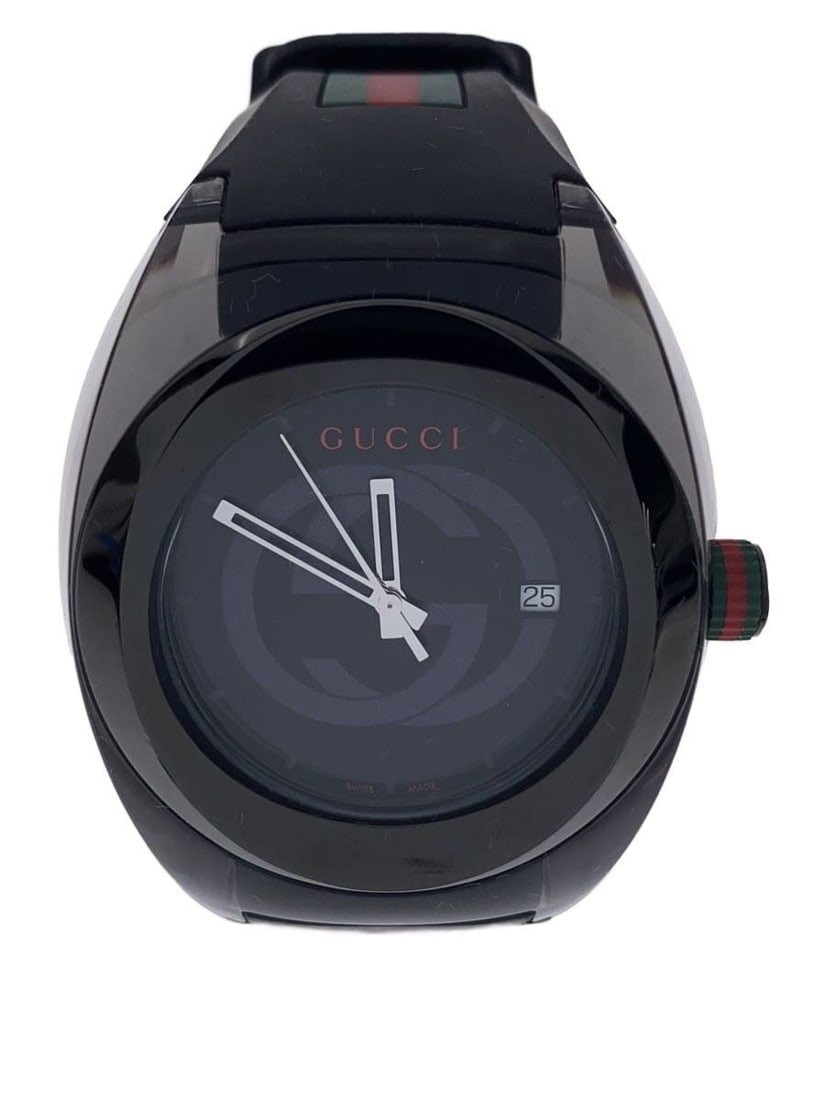 Gucci Synk Quartz Men's Wristwatch 137.1 Swiss Made: Gucci Synk Quartz Men's Wristwatch 137.1 Swiss Made This is a pre-owned GUCCI SYNK Quartz 137.1 men's wristwatch featuring a Swiss-made quartz movement. The watch shows slight signs of use and is desi